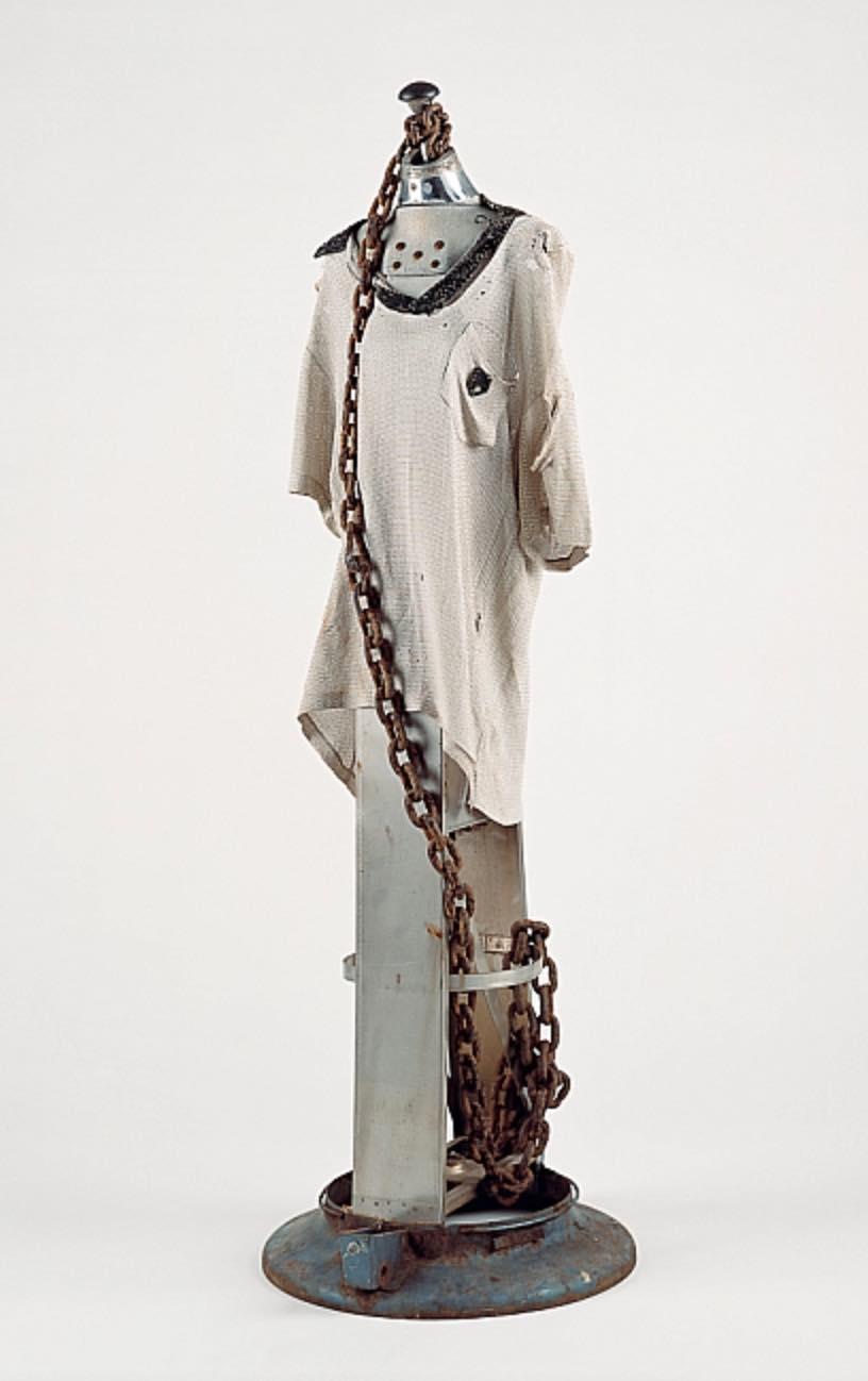 gallery thumbnail - Ramanda Miller - Image 1 Title Ramanda Miller - Image 1  / Title: Chains Of A Dummy’s Body • Artist: Lonnie Holley (American, born 1950) • Date: 1984 • Medium: Dress form, used clothing, chain • Dimensions: 55 ½ x 17 ½ x 19 ¾ inches • Credit: Souls Grown Deep Foundation  