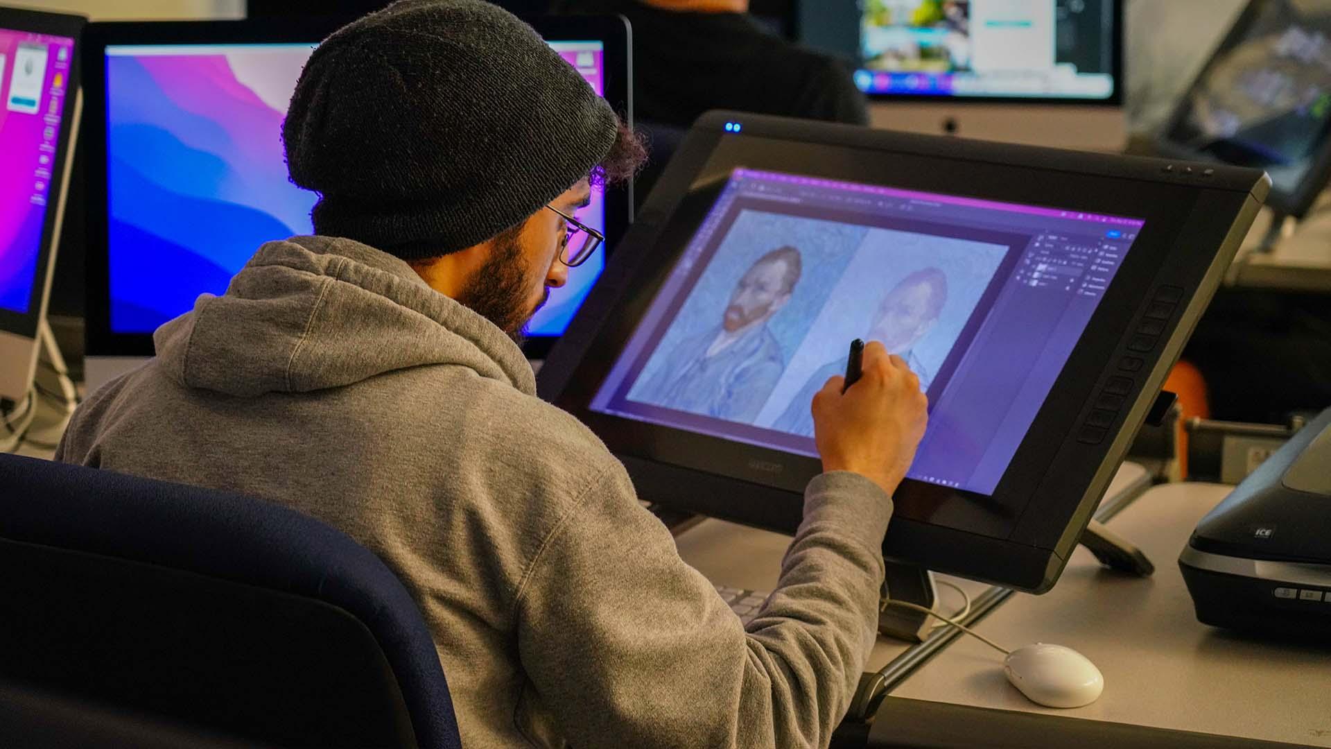  / Student replicating Van Gogh portrait digitally.  
