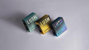 Lush  / “Lush,” soap packaging, 3 inches x 3 inches x 1.25 inches, 2023. The Lush soap bar repackaging aims to add more flare in a functional form that brings excitement to your typical soap car while staying consistent with branding guidelines.  