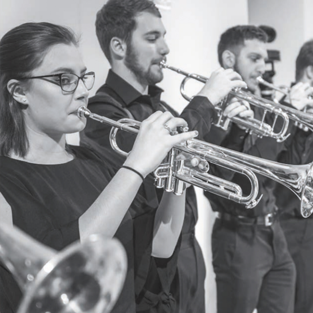 black and white photo of trumpet performers