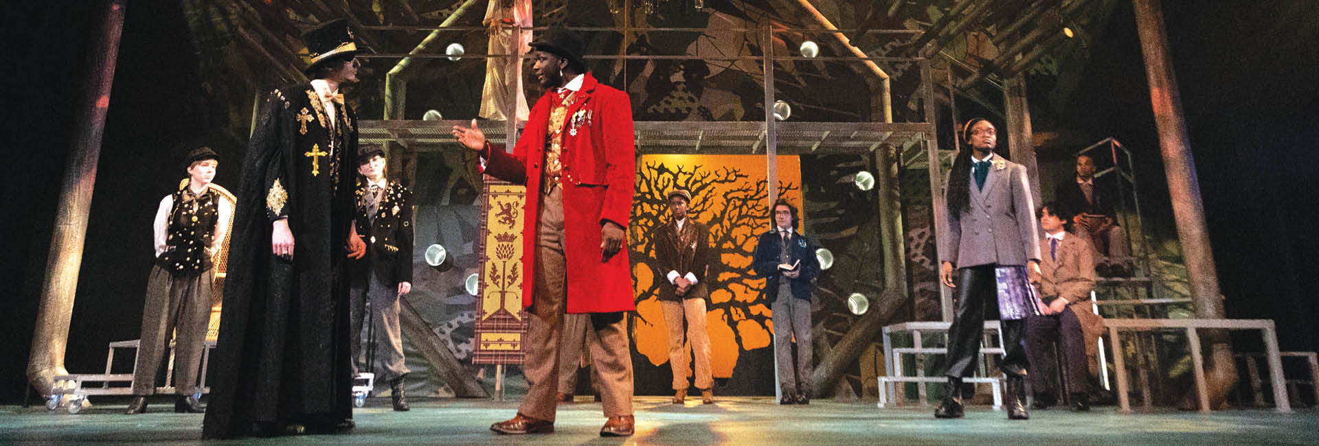 actors on stage in costume