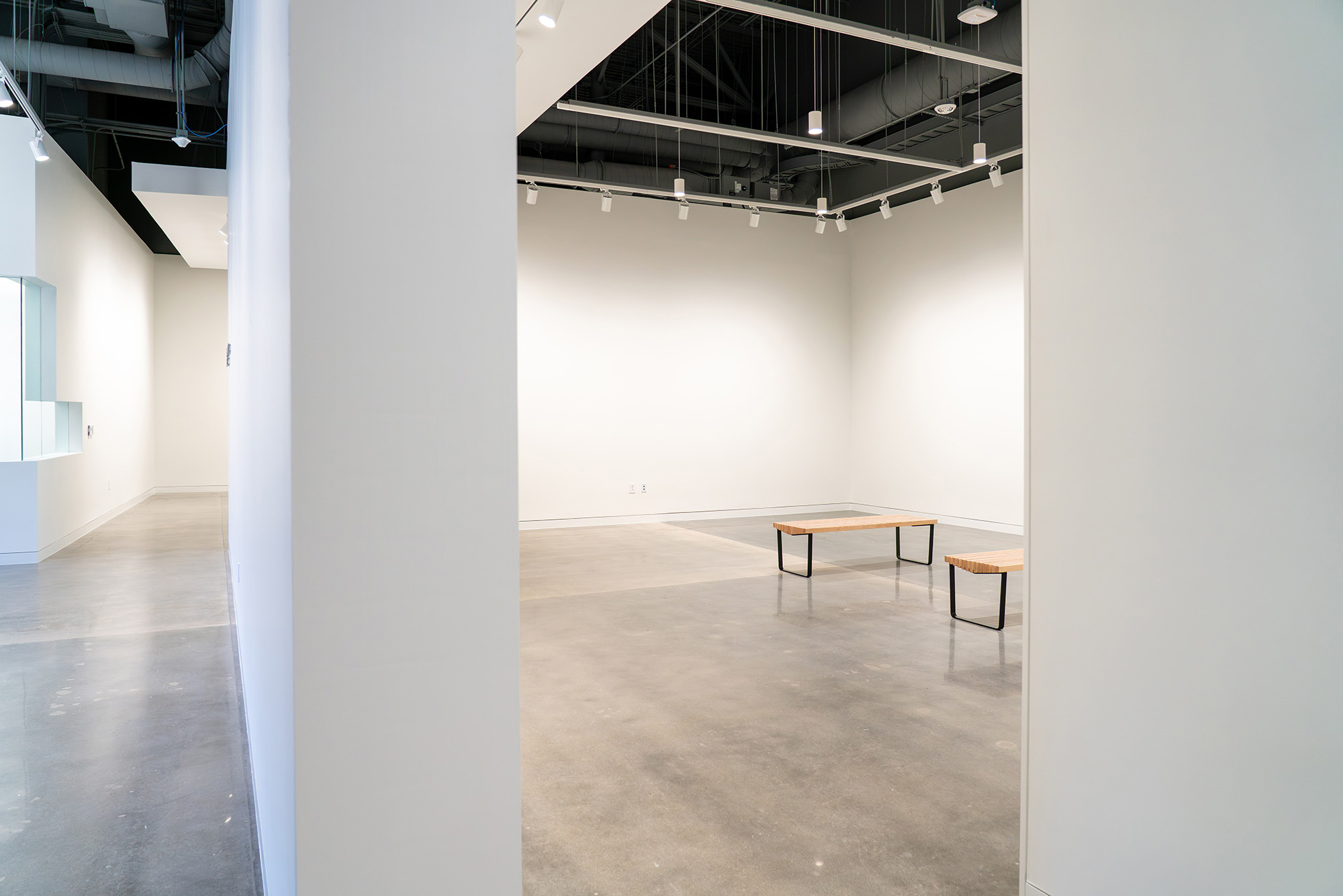 image of new art gallery with open space and white walls