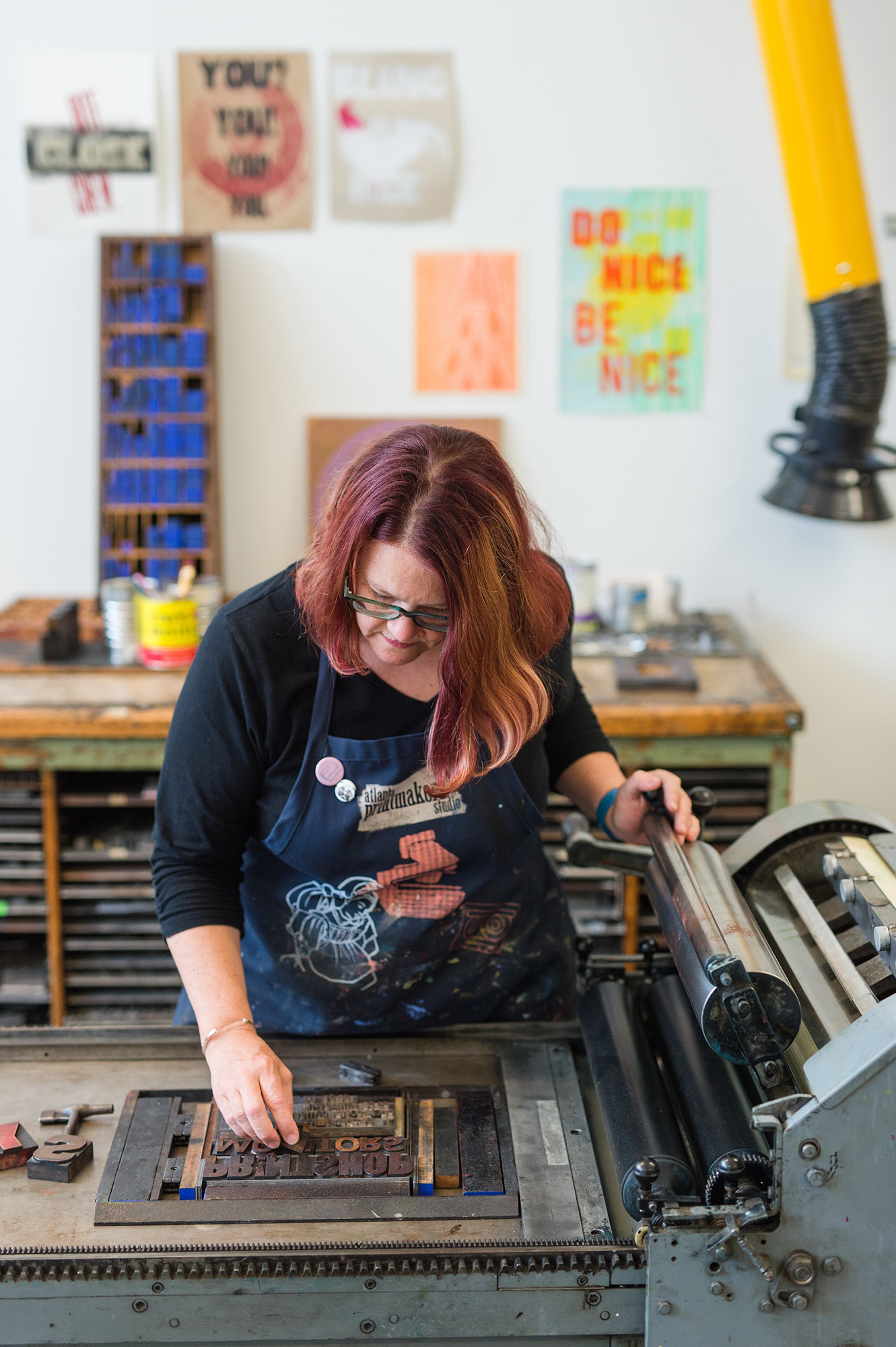 image of woman screenprinting