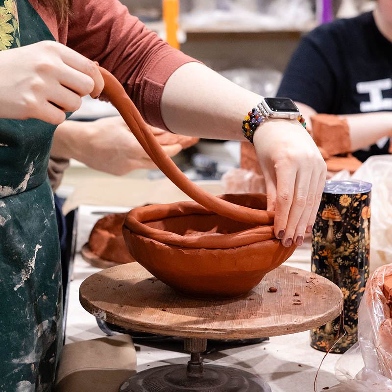Pottery student
