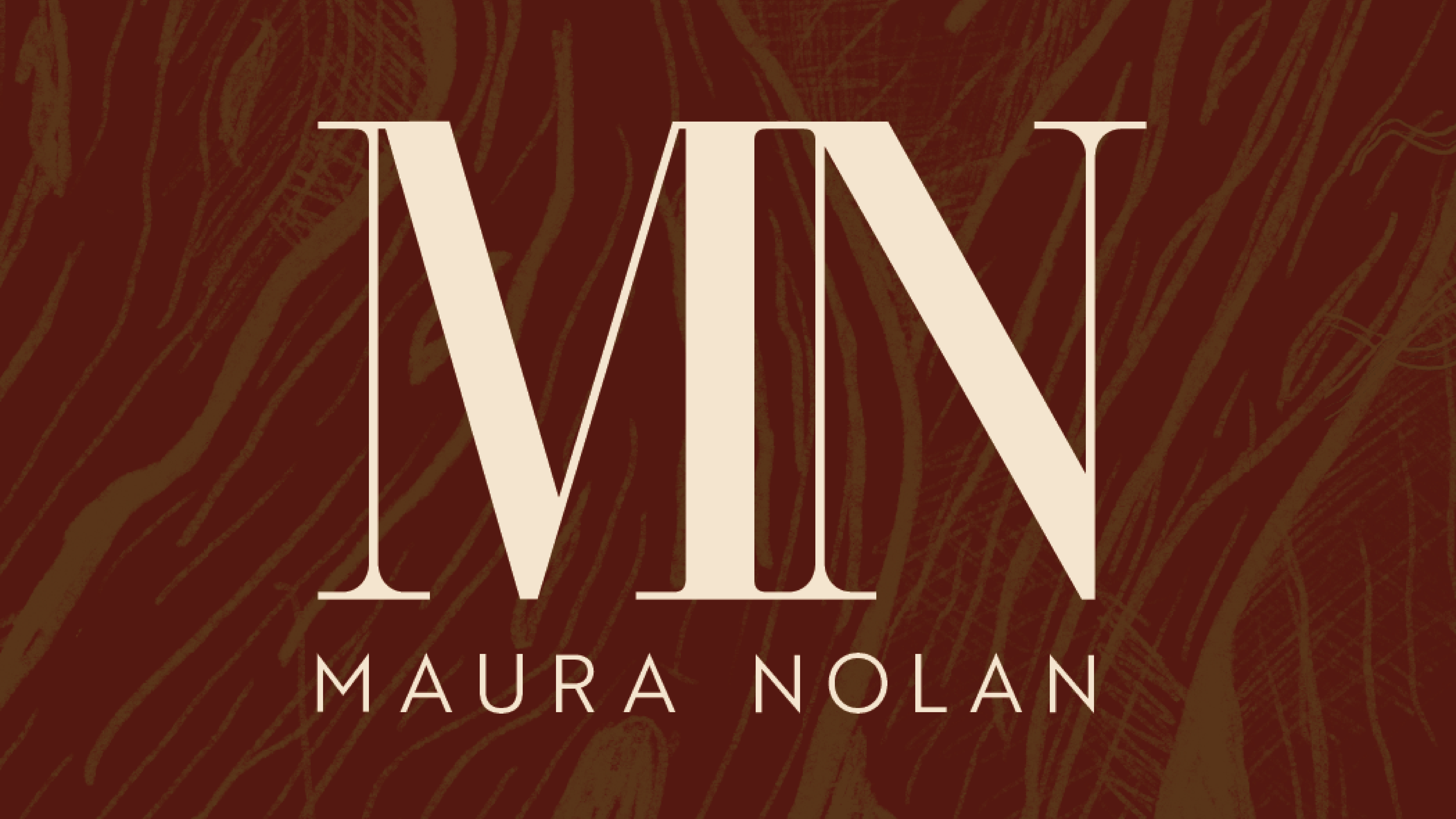 Tan "MN" Letters on a brown background