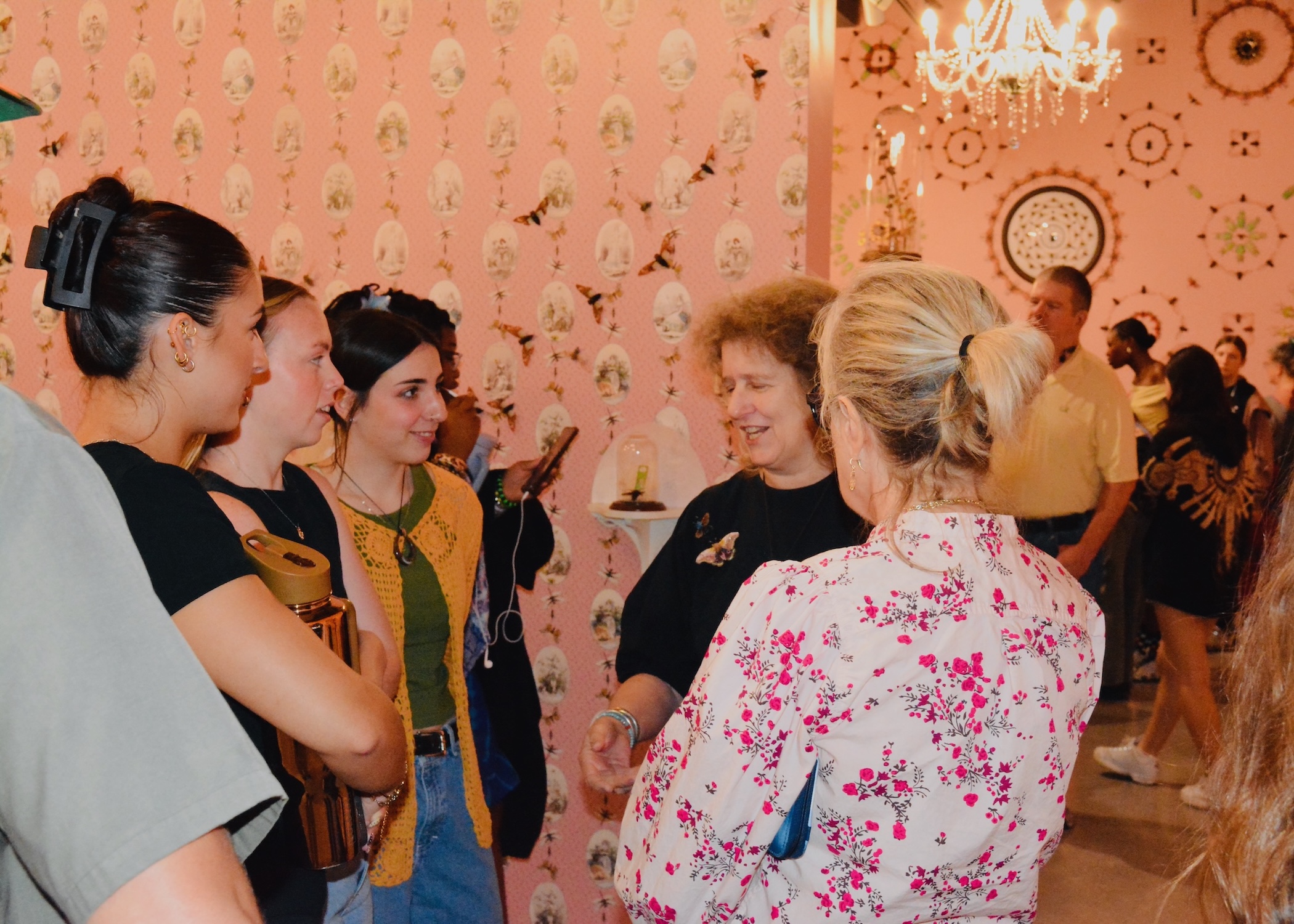 Artist Jennifer Angus speaks to students at the opening of her installation "Lady Bug" at at the ZMA