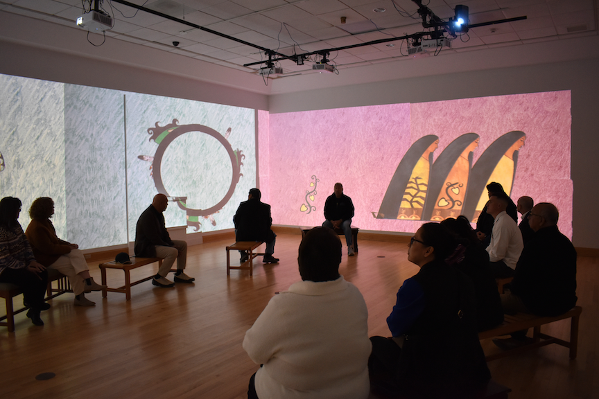 viewers attend an immersive gallery experience, enjoying Carson Waterman's art