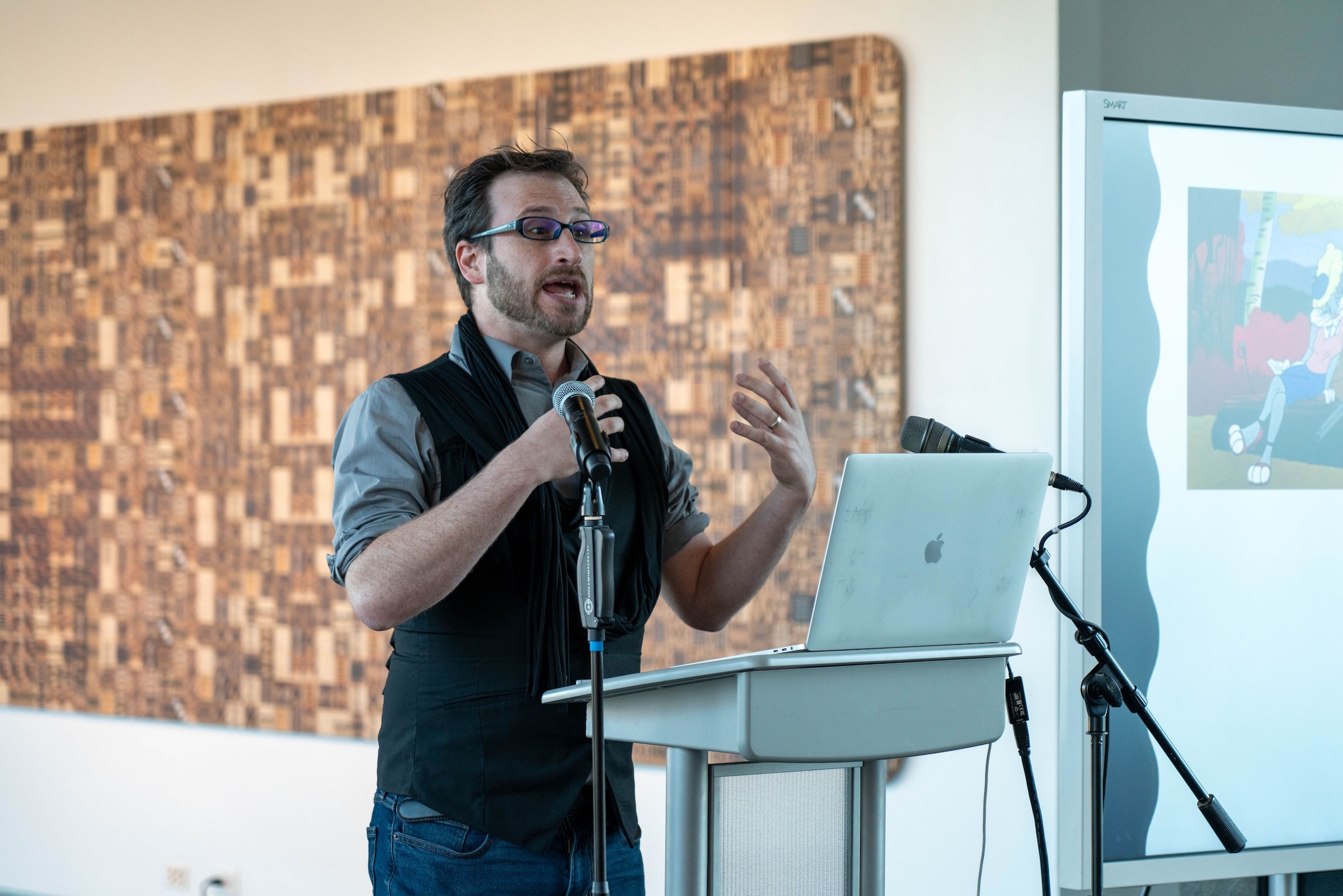 Assistant Professor Jeremy Speed-Schwartz lectures about a history of animation