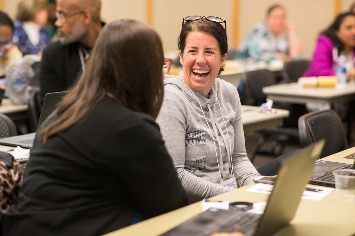 Mobile Learning Summit / Mobile Learning Summit
Group at tables listening to Seminar
