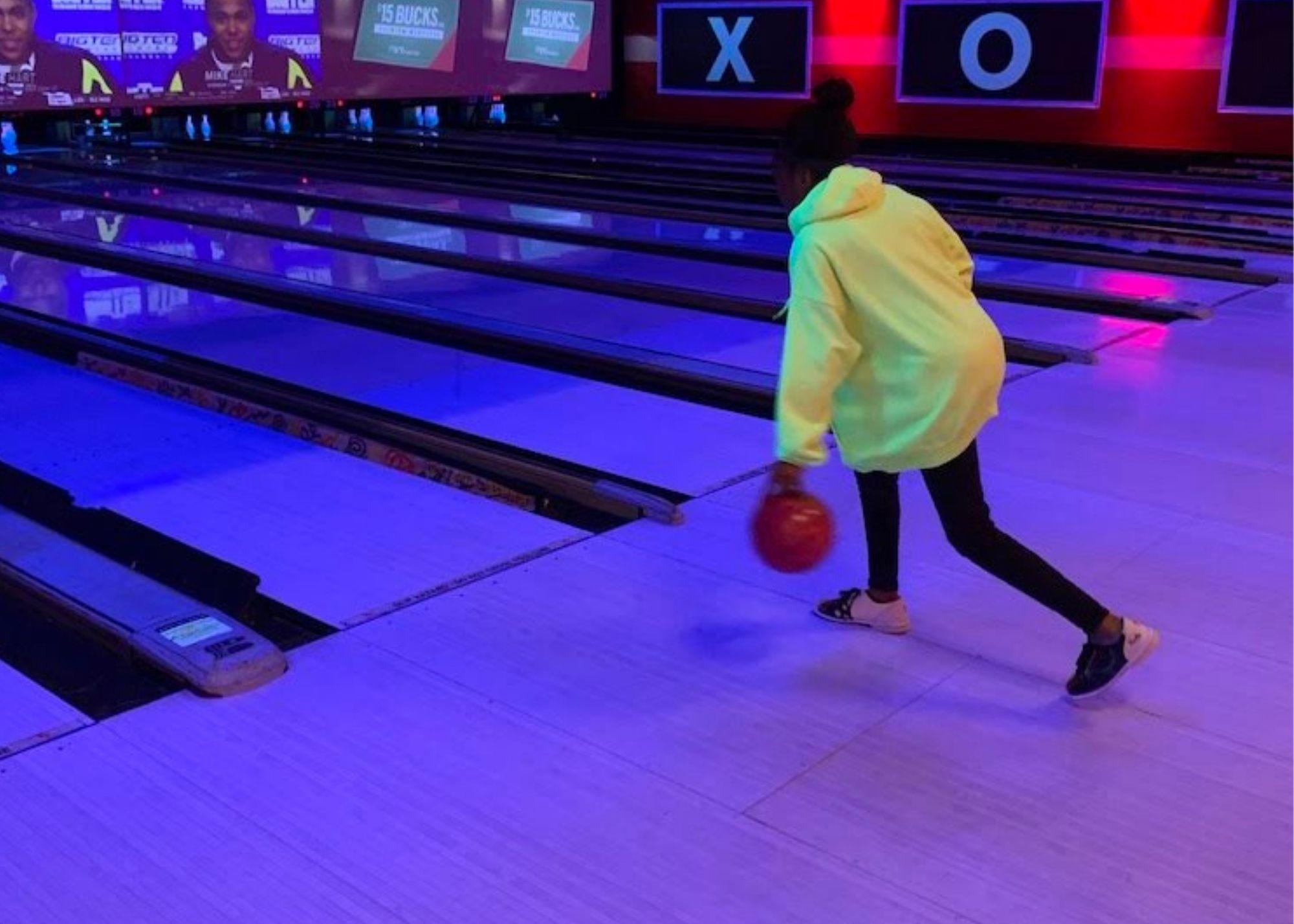 Young student bowling.  / KSU TRIO students learn the physics behind everyday activities like bowling. 