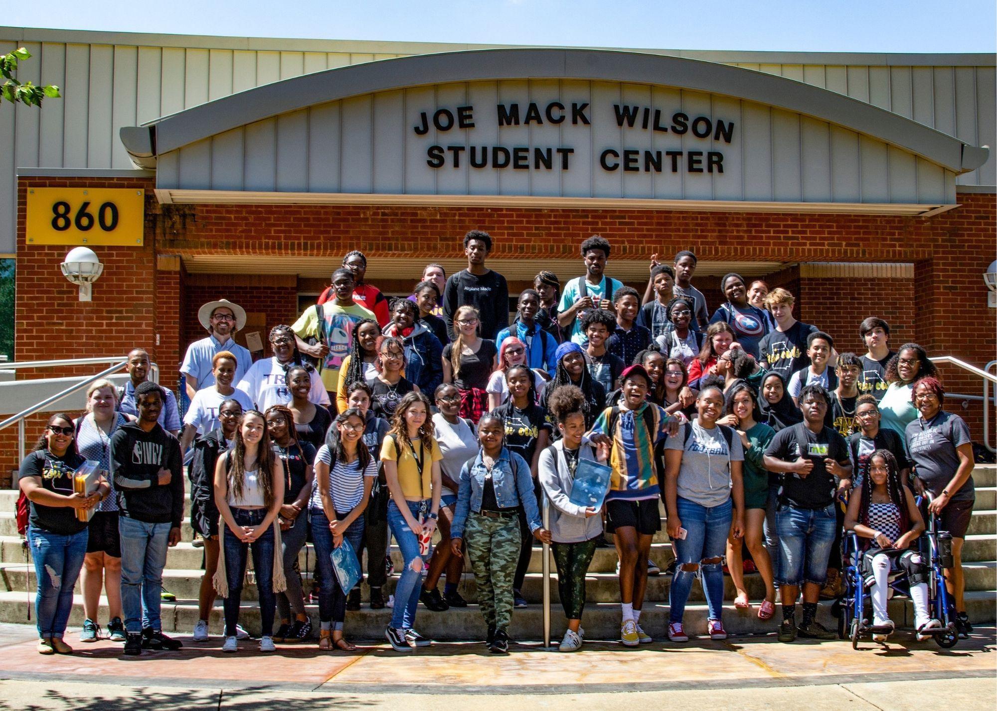 Students outside standing in front of the Joe Mack Wilson Student Center  / KSU TRiO holds an annual Summer Academy to help prepare students for the upcoming school year and provide a space for students to explore potential career options 