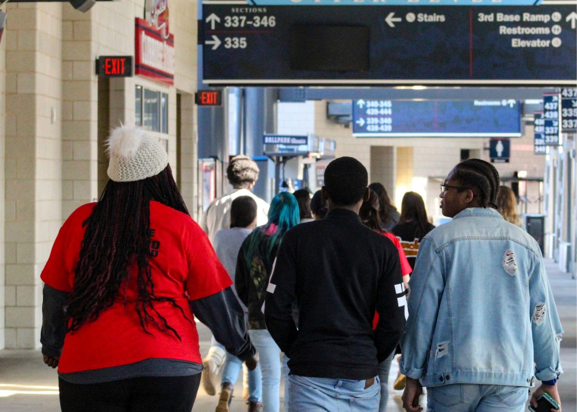 People walking through Suntrust Park stadium  / KSU TRiO Upward Bound at Rockmart and Cedartown High Schools visit the Suntrust Park to learn about stadium construction and architecture. 