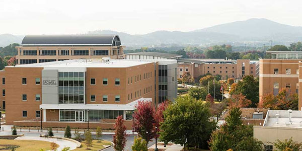 BCOE building at Kennesaw State University with a scenic mountain backdrop.