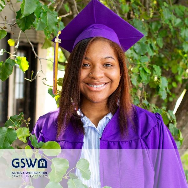 Cydni Tyler, a smiling graduate wearing a purple cap and gown, with the Georgia Southwestern State University logo in the bottom left corner.