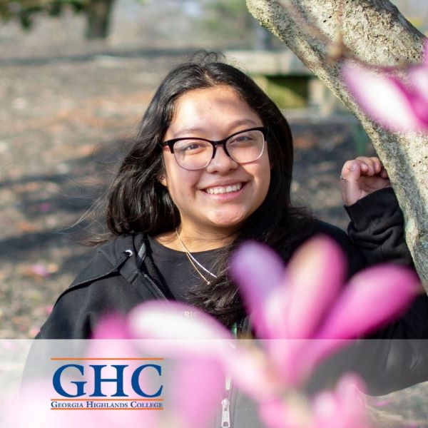 Desli Perez-Velasquez, a smiling student in a headshot with the Georgia Highlands College logo in the bottom left corner.