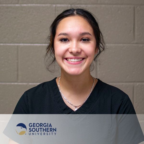 Jasmine Sanchez, a smiling student in a headshot with the Georgia Southern University logo in the bottom left corner.