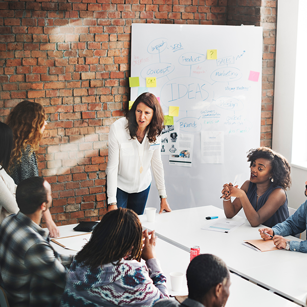 teacher at table with other adults