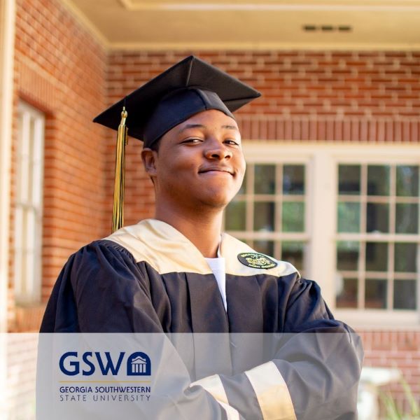 ZyKarius Harshaw, a graduate in a cap and gown, with the Georgia Southwestern State University logo in the bottom left corner.