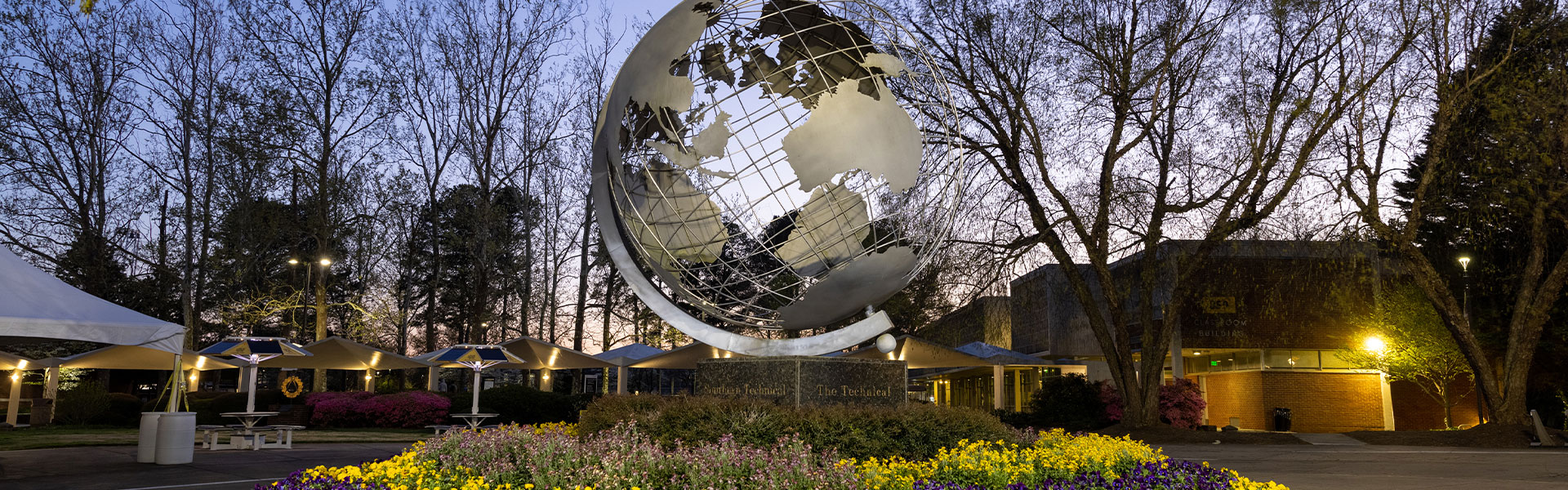 marietta globe at dusk on campus.