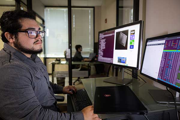 student utilizing computer lab