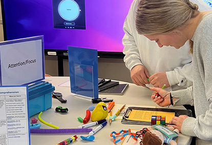 ksu student working on a project in the UD lab.