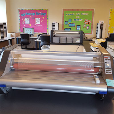 laminator sitting on table.
