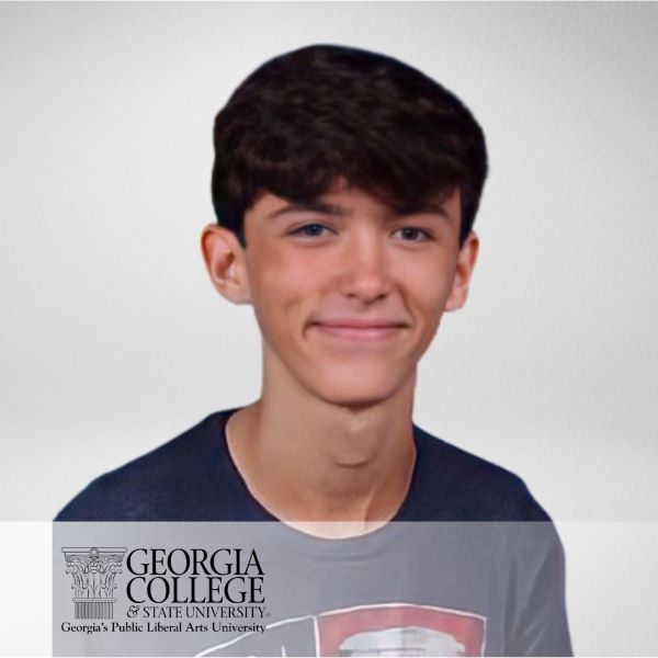 Logan Parker, smiling in a headshot with a neutral background.