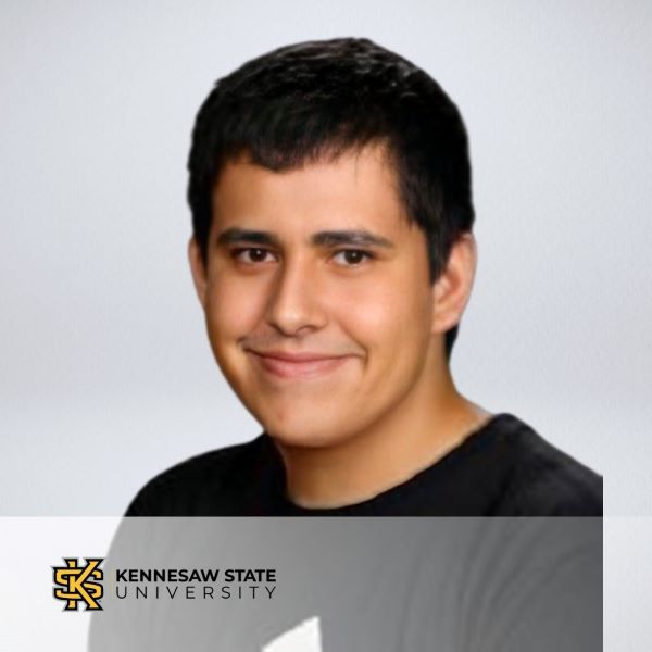 Marcus Solis, in a headshot with a neutral background.