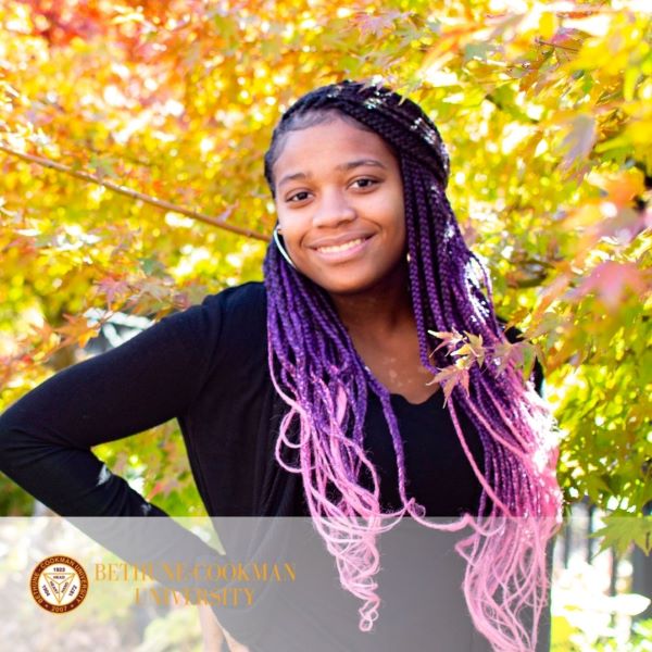Quimara Anderson, smiling in a headshot, with the Bethune Cookman University logo in the bottom left corner.