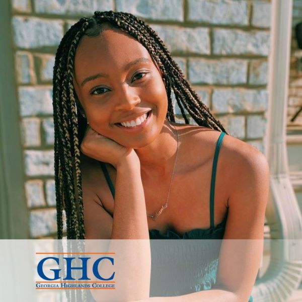 Shania Joseph, smiling in a headshot near a brick wall with the Georgia Highlands College logo in the bottom left corner.