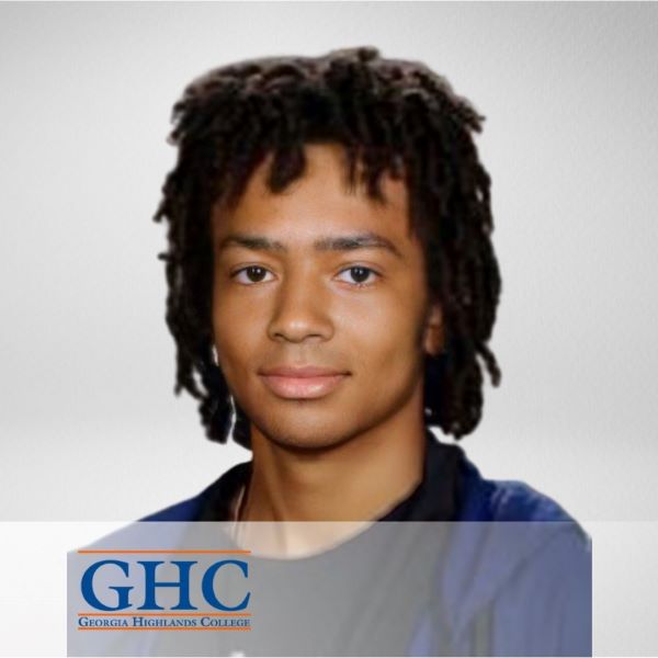 Shane Puello, in a headshot with a neutral background, with the Georgia Highlands College logo in the bottom left corner.