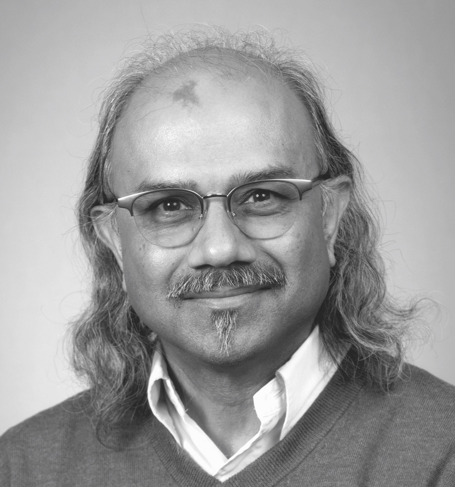 Saif Haq professional headshot in black and white.