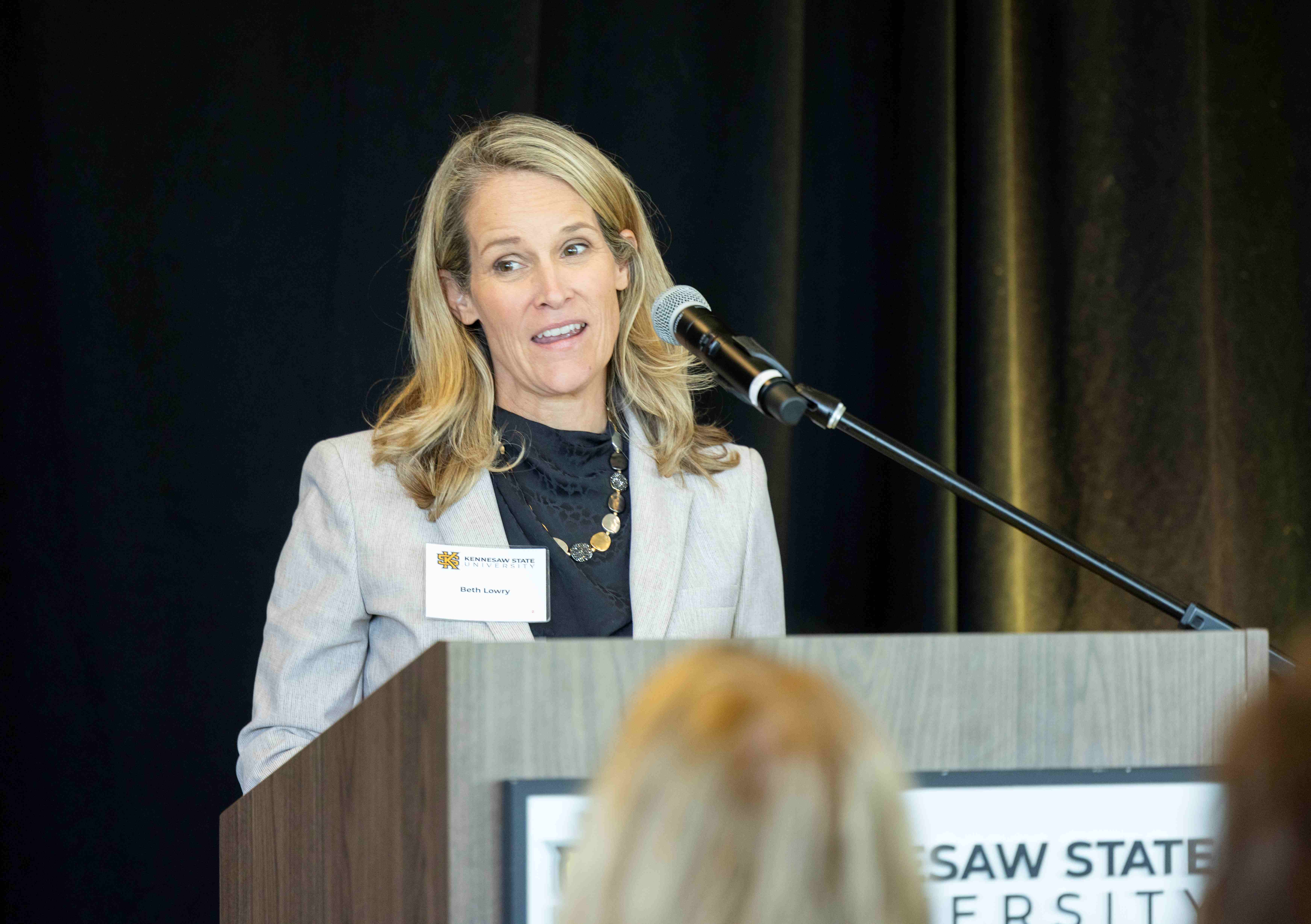 Beth Lowry speaks at KSU event. 