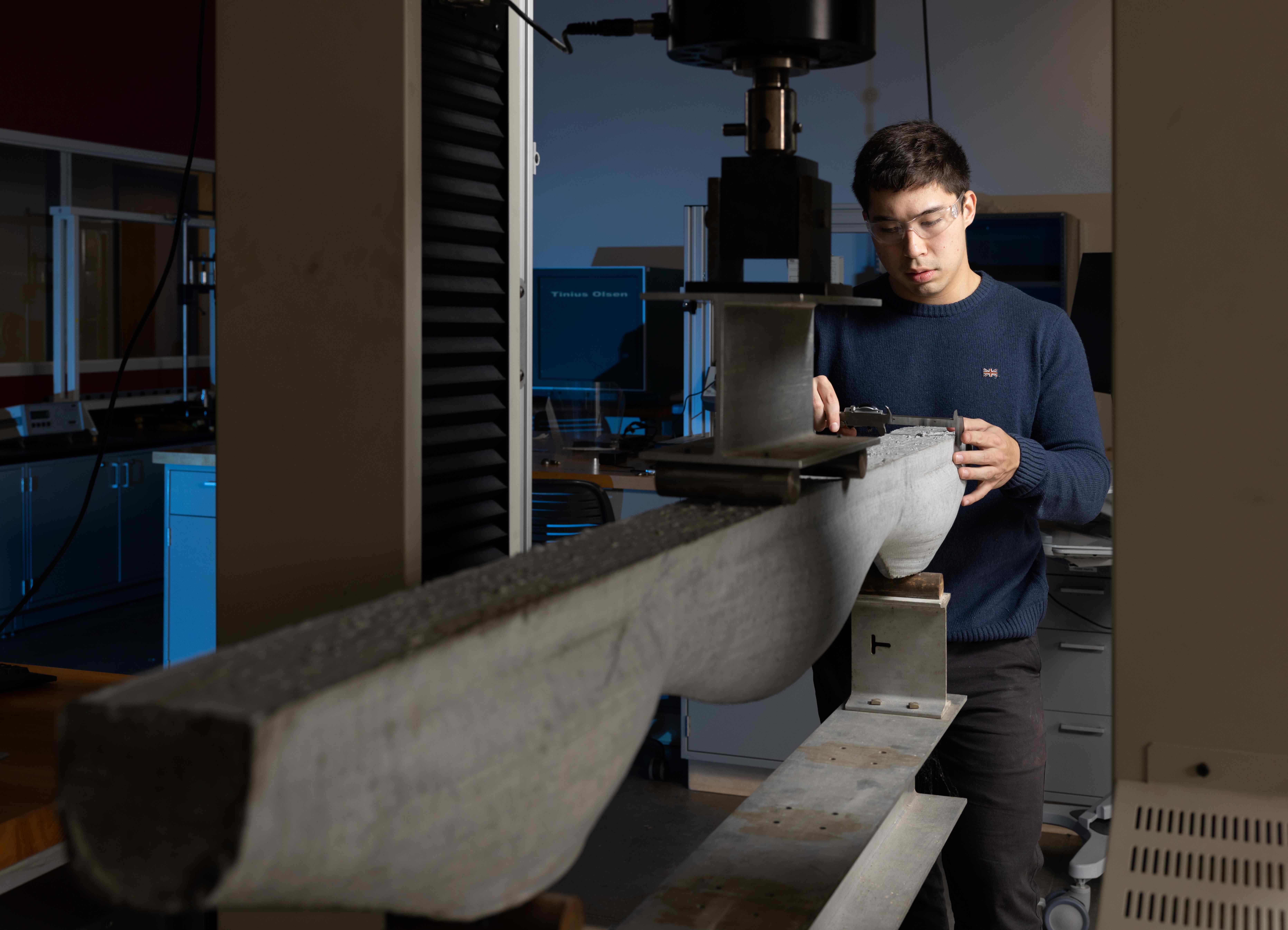 Student conducting building materials research.