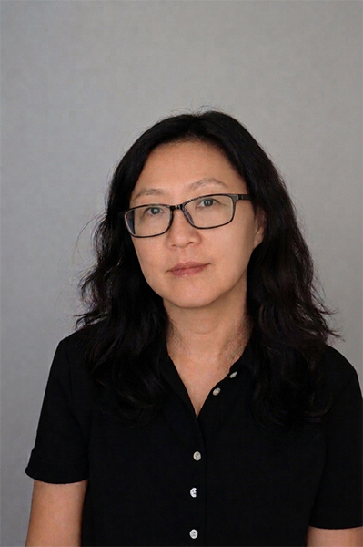 Michelle Zhu, Software Engineering and Game Development Department Chair, smiles.
