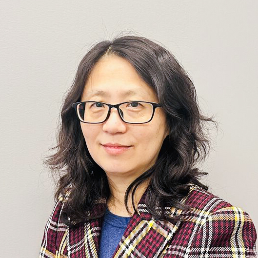 Michelle Zhu, Software Engineering and Game Development Department Chair, smiles.
