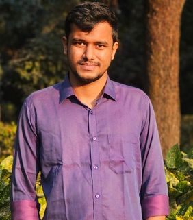 man in purple shirt