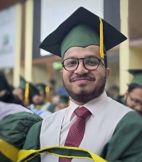 smiling man with green cap on