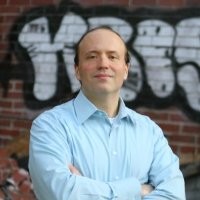 CGDD Advisory Board member Andrew Greenberg poses..