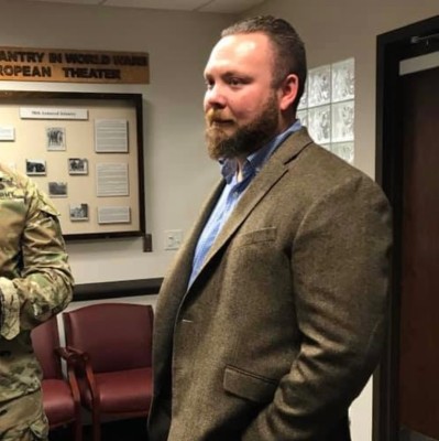 CGDD Advisory Board member Kent Gilbert listens in on a conversation..