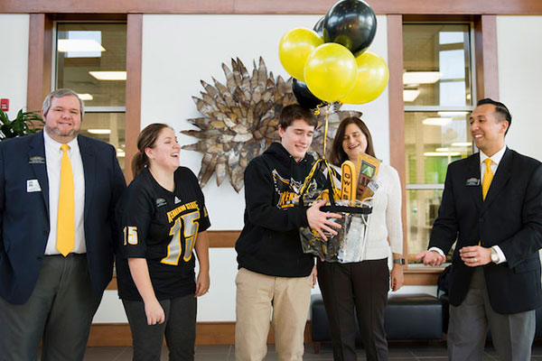 The visit by Kennesaw State included, from left, Jordan Stevenson, associate director for admissions; Rebecca Cox, admissions marketing coordinator; David VanAsselberg; Kimberly VanAsselberg; and Wisam Mahra, admissions director. 