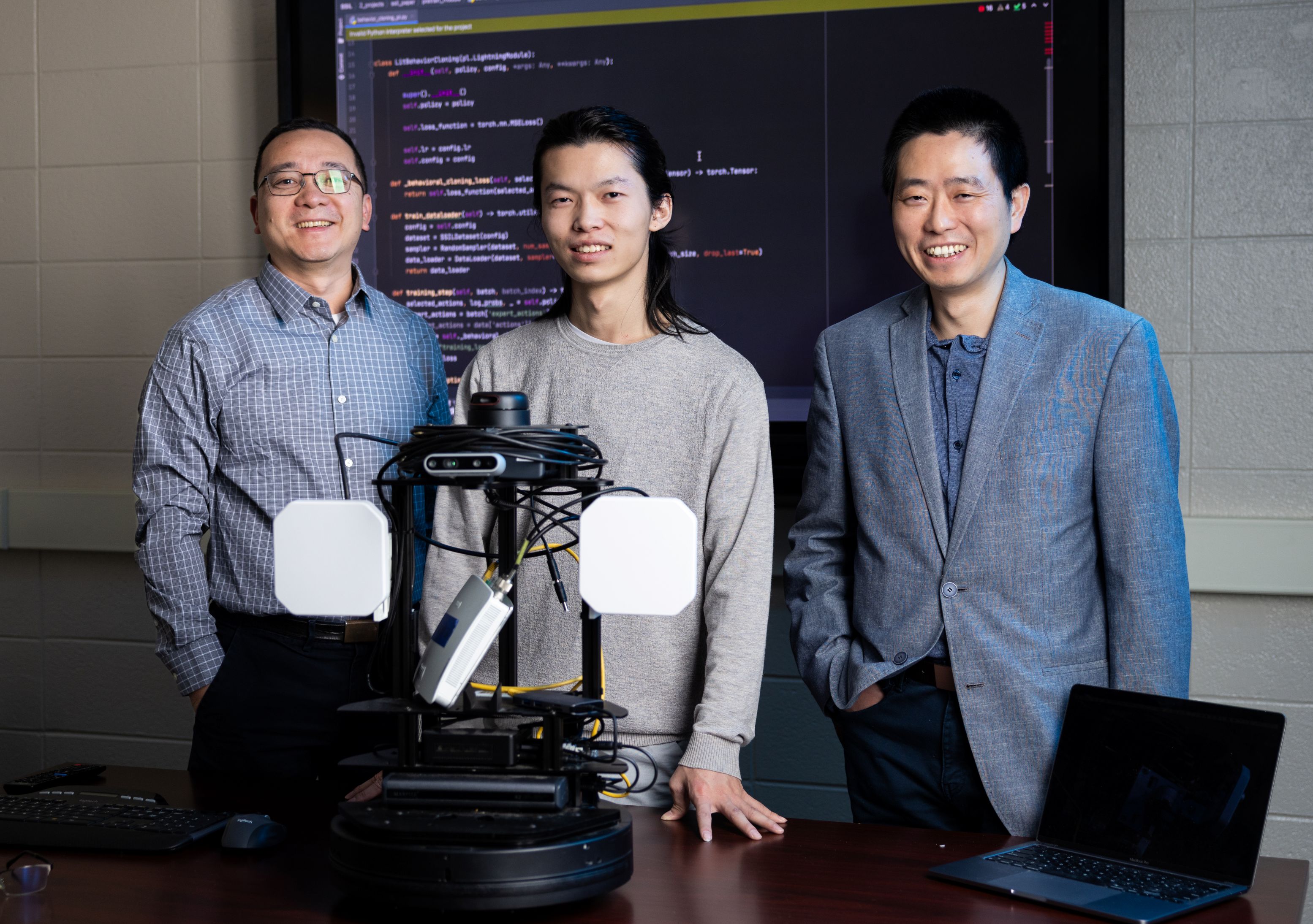 Student and professors show off their robot