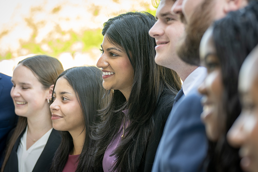 a group of accounting students standing in a row
