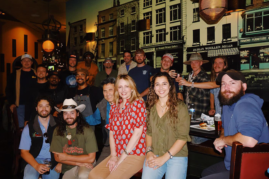 Jimbo Livaditis (bottom, third from left) and his wife Leigh Ann, along with their children John, Lucas, and Anastasia, gather with their team in November to kick off the 2025 season.