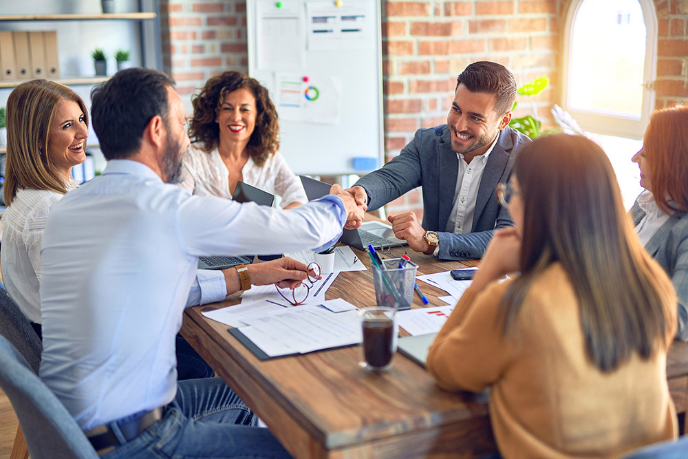 photo of a group of people at a table