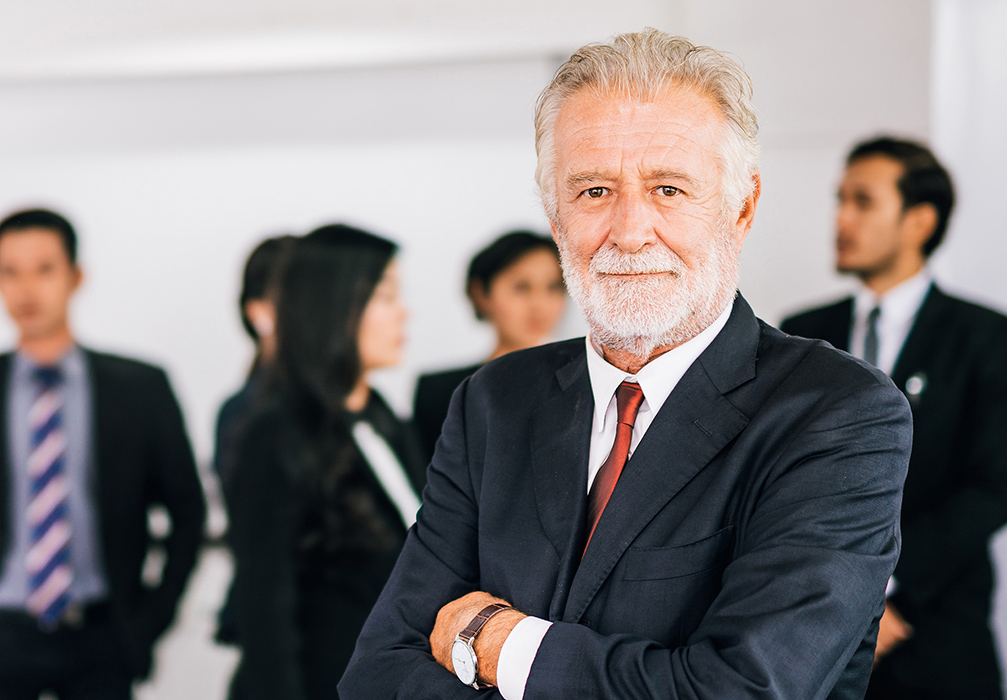 I man in a suit in a formal business setting