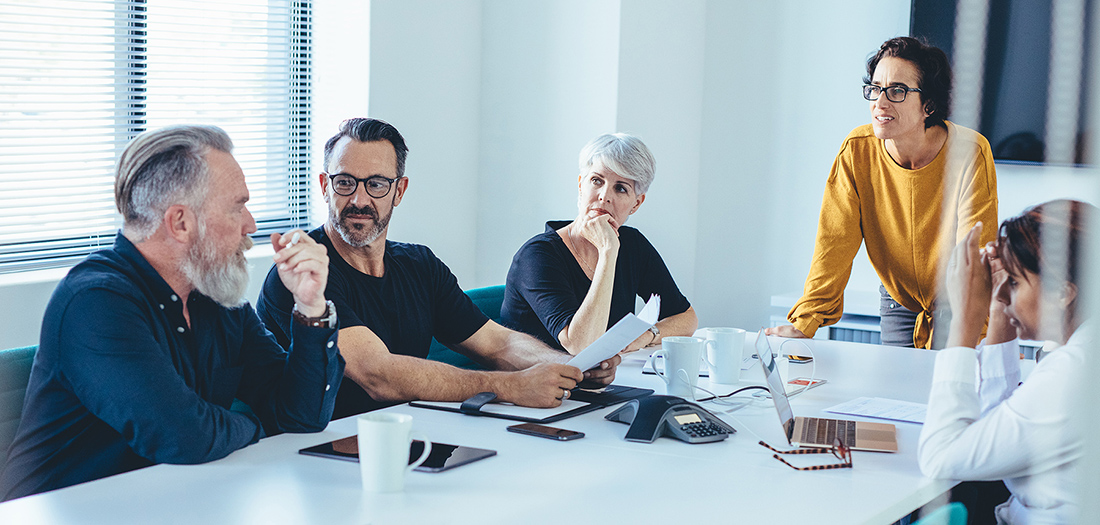 Men and women in business meeting