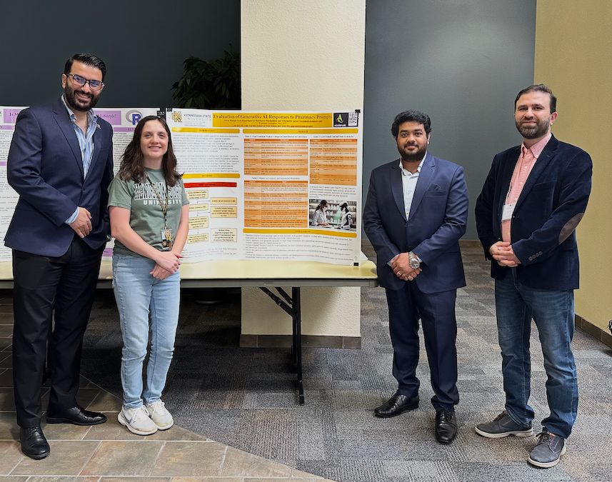 group photo with Dr. Abrar Hussain Syed standing with his research