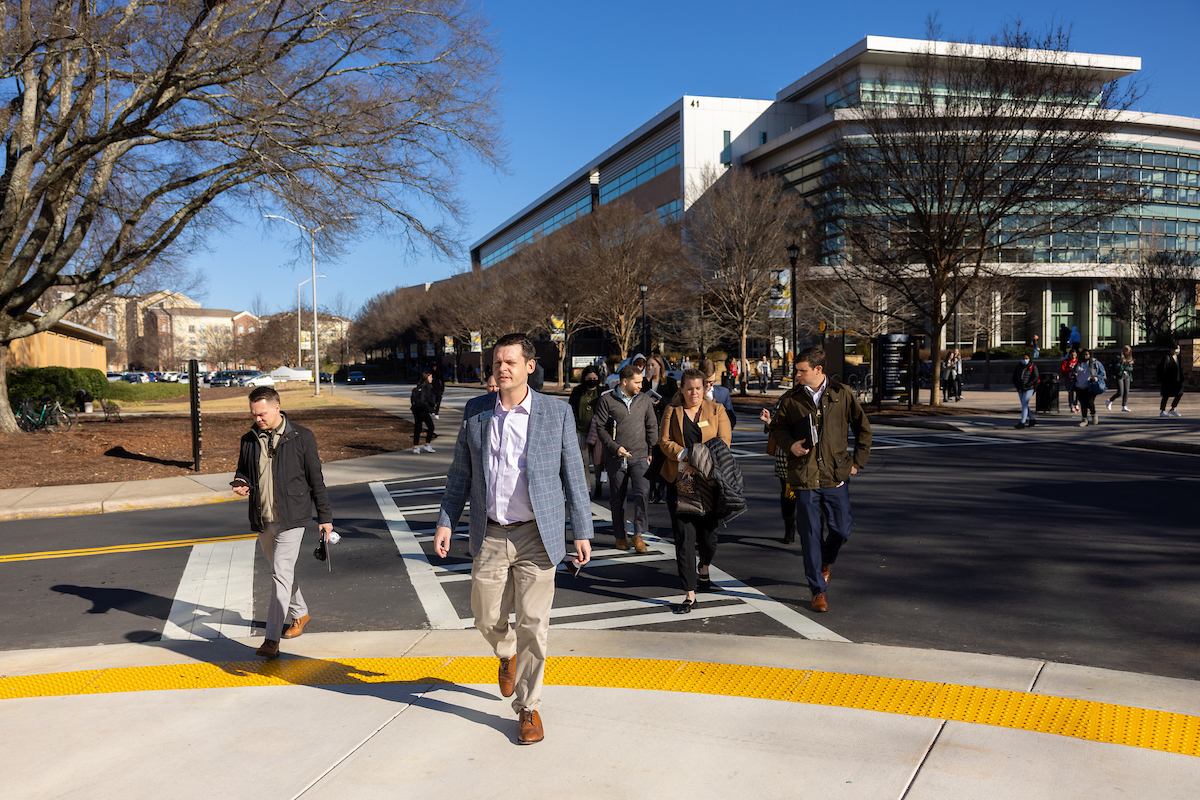 coles schools of business economic majors walking across ksu campus