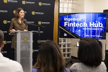 President Kathy Schwaig speaks at the opening of the Ingenico Fintech Hub